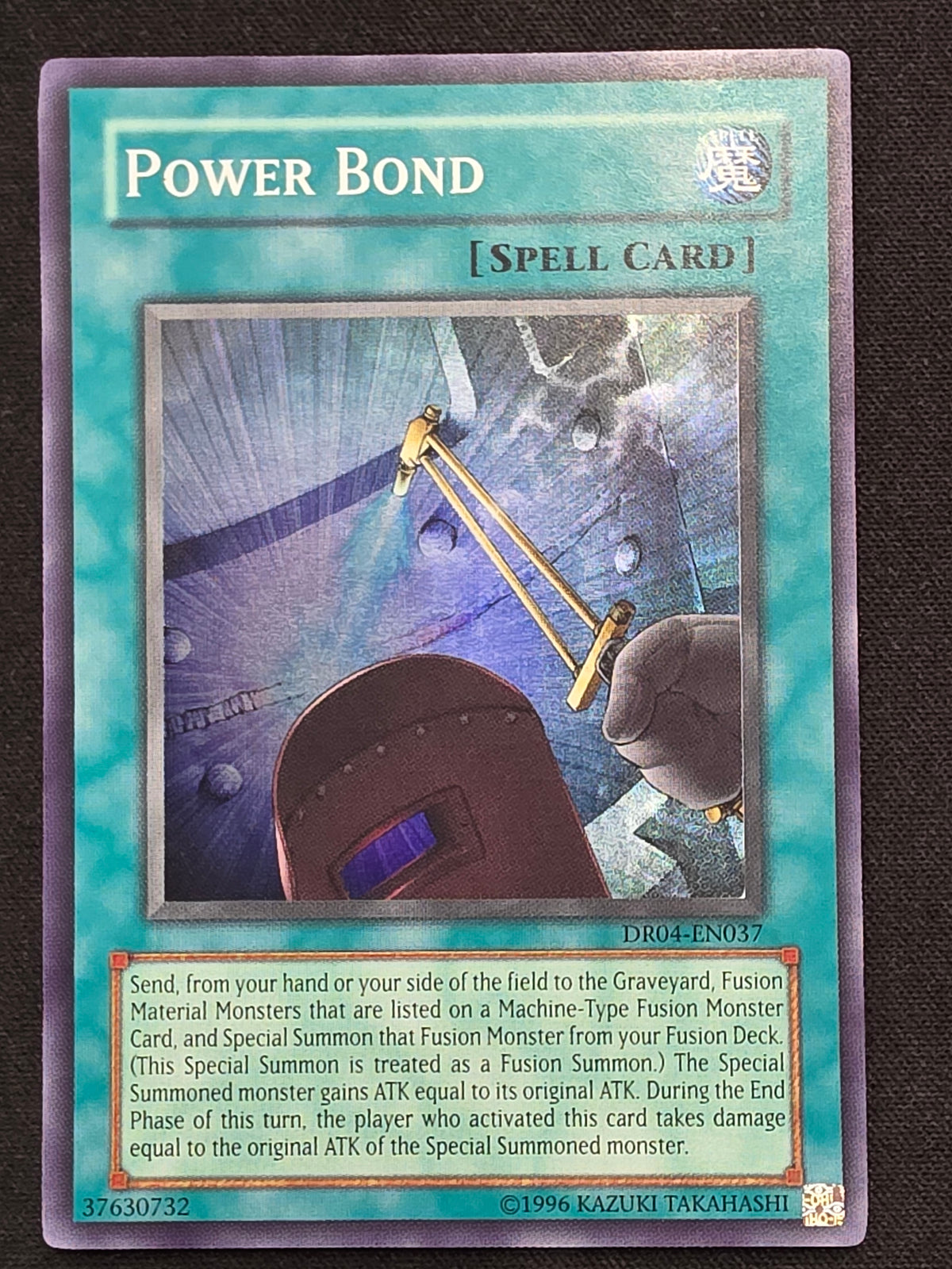 Power Bond (DR04-EN037, Super Rare)