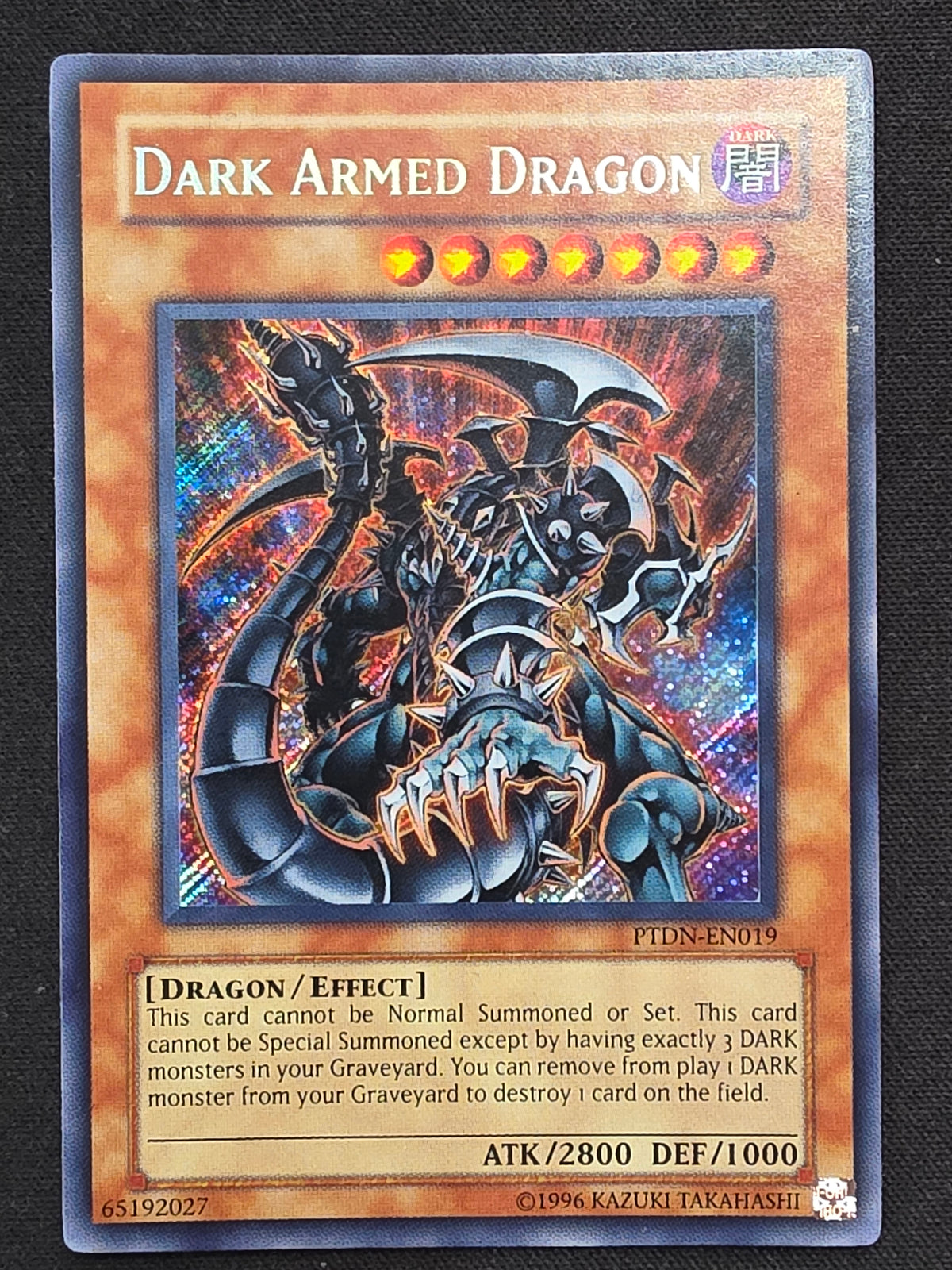 Dark Armed Dragon (PTDN-EN019, Secret Rare)